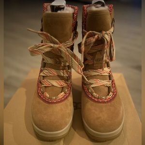 Size 8.5 never worn Ugg classic hiker boots in chestnut.